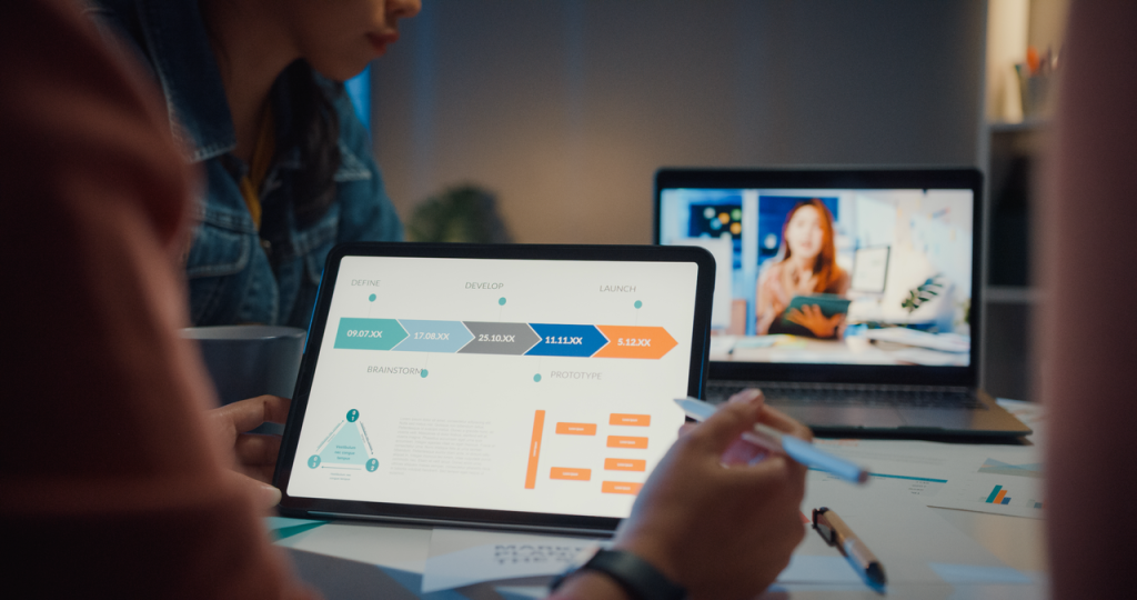 Virtual meeting where manager shares productivity metrics with remote team