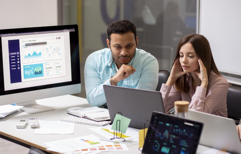 Hybrid team collaborating online with project management software