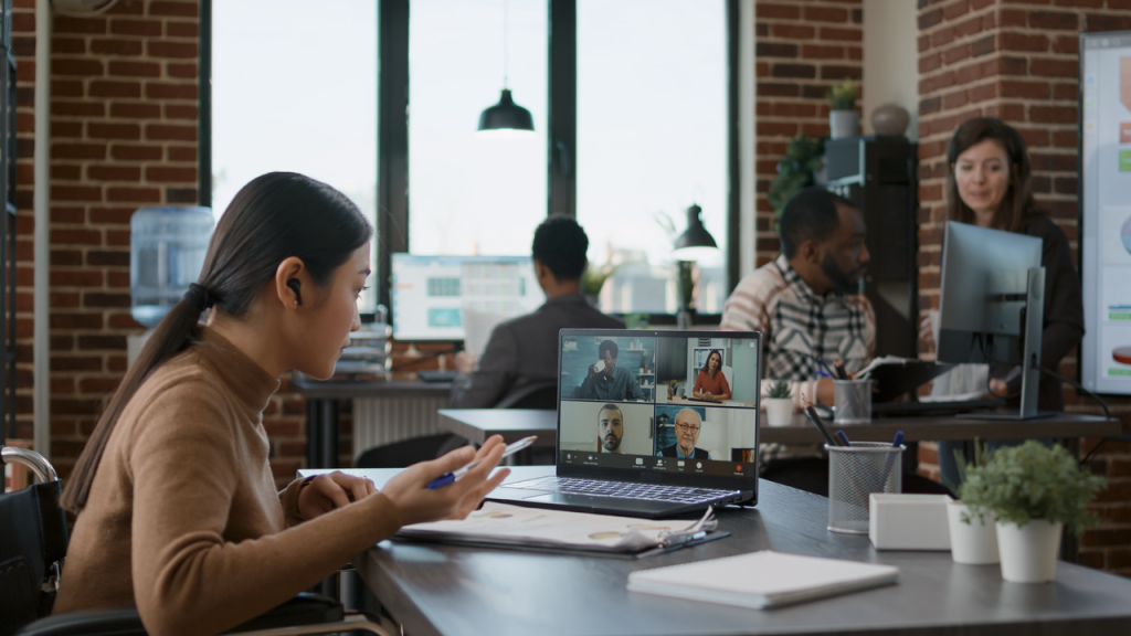 Hybrid employees collaborating on shared digital workspace, hybrid & remote team productivity